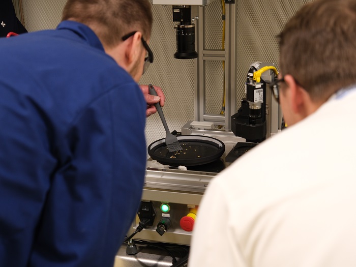 Scientists examining embryo